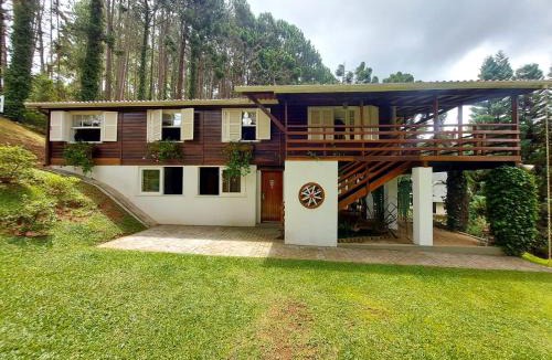 Jardim Europa House | Casa dos Pinheiros Campos do Jordão