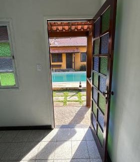 Ogiva House | Casa em condomínio aconchegante na beira de canal