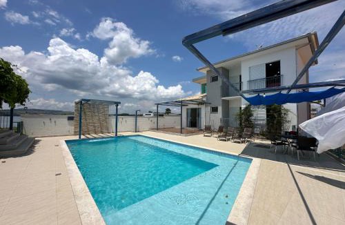 Guape House | Casa Florida do Lago