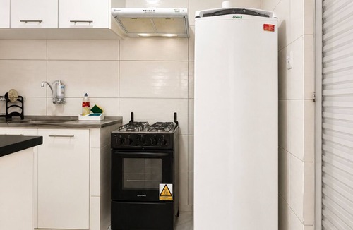 Cremacao House | Casa Laranja com Split e Wi-Fi 700 MB
