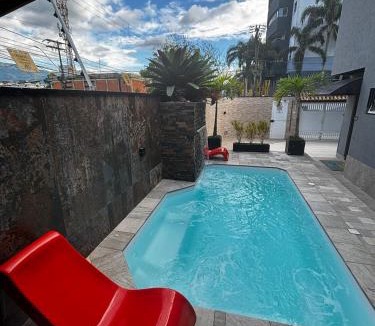 Centro House | Casa Pé na Areia com Piscina Climatizada