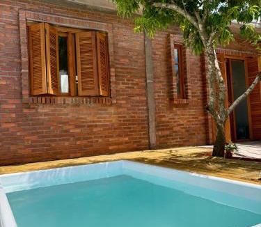 Querencia House | Casa quadra-mar com piscina