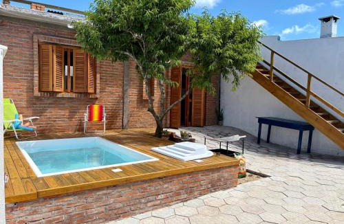 Querencia House | Casa quadra-mar com piscina