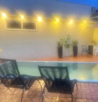 Vila Messias House | Casa Tropicale House accommodates family and work