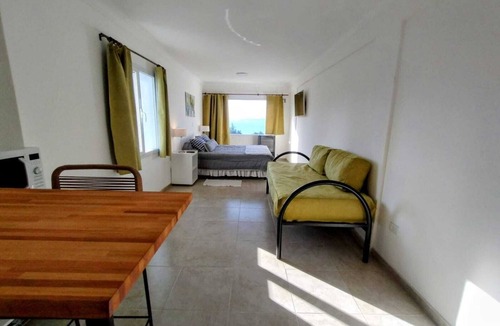 Centro Apartment | Centrally located studio with beautiful lake view.