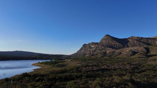 Lapinha da Serra Apartment | Chalé Aconchego da Lapinha Vista para Montanhas Piscina e Natureza