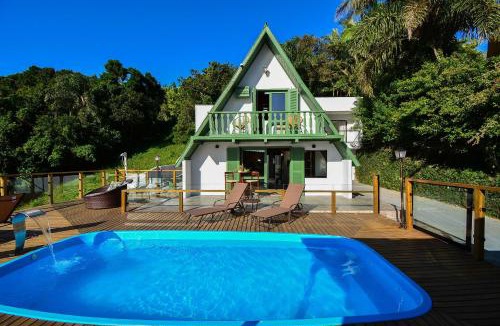 Palhoca Ski Chalet | Chalé com Jacuzzi e Vista Mar - PLH007