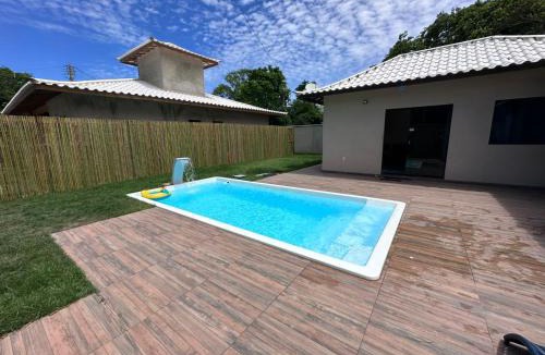 Caravelas House | Chalé com Piscina e Churrasqueira Privativos