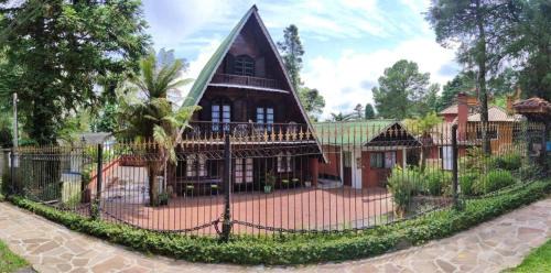 Bairro Lago Negro Hotel | Chalé das Neves