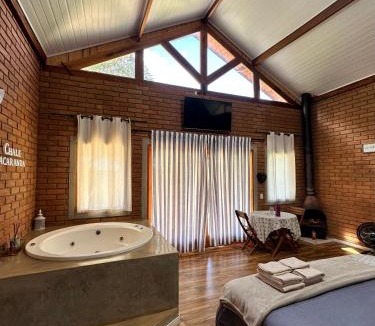 Sapucai-Mirim Ski Chalet | Chalé Jacarandá - Hidro - Lareira & mais