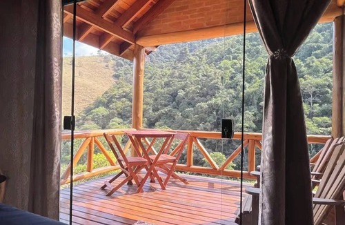 Sapucai-Mirim Ski Chalet | Chalé Recanto da Mata - Romantic chalet with mountain views and a hot tub.