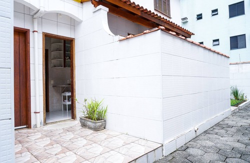 Praia Grande House | Charming beachfront townhouse in a gated community.