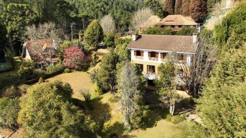 Loteamento Jardim Veu da Noiva House | CJ0. Sua casa de Campo em Campos do Jordão