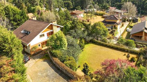 Loteamento Jardim Veu da Noiva House | CJ0. Sua casa de Campo em Campos do Jordão
