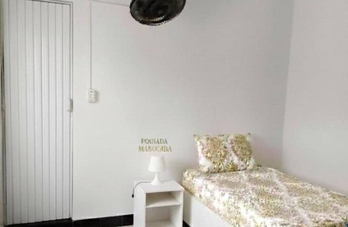 Pereque Hotel | Comfortable accommodation with air conditioning and a fan. Well-Maintained Suite #2