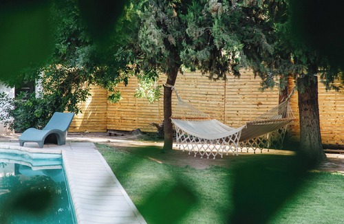 Chacras de Coria House | Comfortable house with swimming pool and garden in warehouse area
