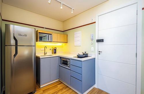 Boa Vista Apartment | Comfortable studio apartment with garage, balcony, air conditioning (hot/cold), and gym.