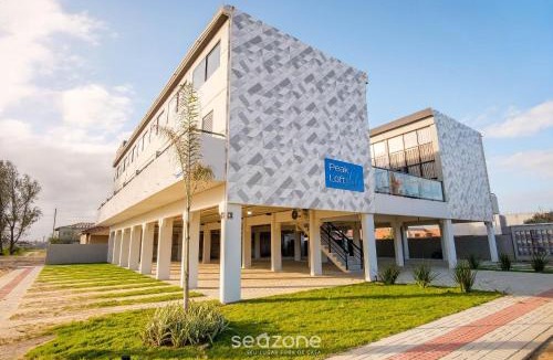 Jaguaruna Apartment | Complete and modern Lofts in Jaguaruna, 50m from the beach - PLO