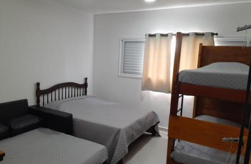 Cachoeira Paulista Apartment | Condomínio da Fé by Casarão Concept