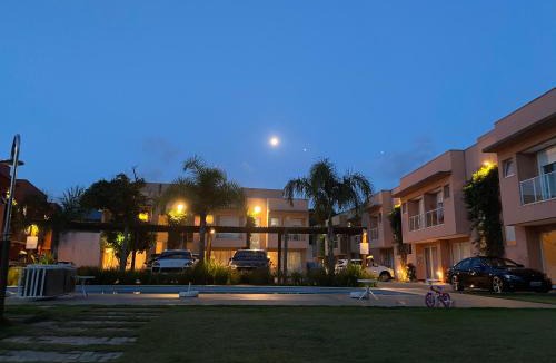 Boicucanga Beach House | Condomínio pé na areia, super novo e confortável.