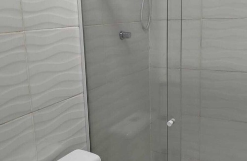 Guaratiba Apartment | Container Black