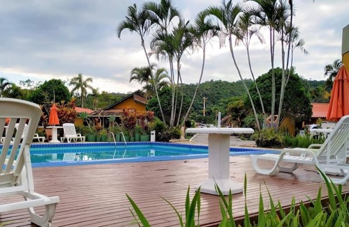 Florianopolis Ski Chalet | Cozy Chalet in a Family-Friendly Condominium with Pool on the Beach