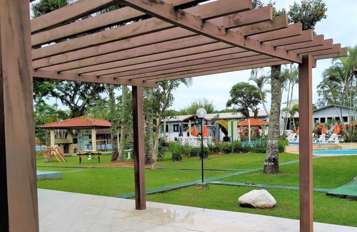 Florianopolis Ski Chalet | Cozy Chalet in a Family-Friendly Condominium with Pool on the Beach