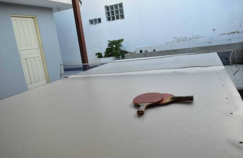 Real Parque House | Cozy room, with TV access to over 400 channels from around the world. Nice place