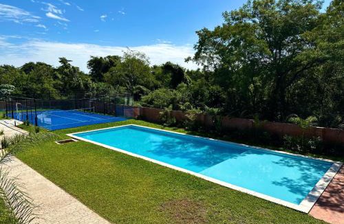 Luque Apartment | Dpto nuevo con piscina a 5 min del aeropuerto