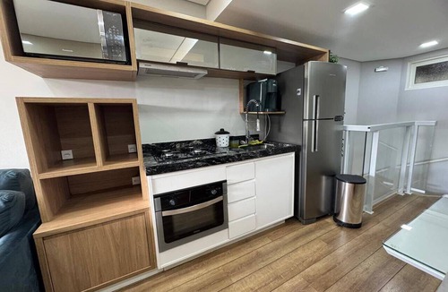 Alto do Capivari Apartment | Duplex in a luxury mountain condominium.