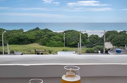 Praia Grande Condo | Duplex Praiano com Vista Incrível da Praia Grande