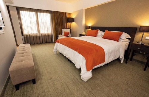 Microcentro Hotel | Escape to a Tranquil Room Near Puerto Madero Riverfront Dining | Rooftop Pool
