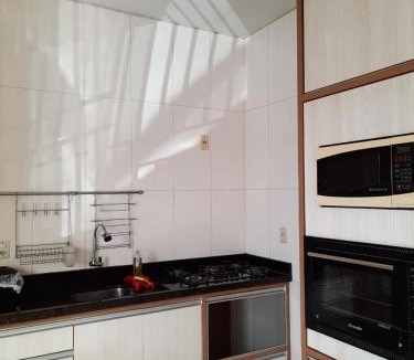Laguna House | Estúdio acolhedor e versátil