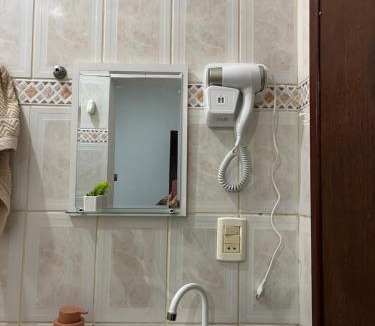 Jardim Ipe Apartment | Flat com ar e varanda com linda vista para o Ibituruna - Vôo Livre 203