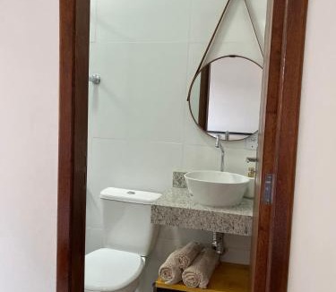 Jardim Ipe Apartment | Flat com ar e varanda com linda vista para o Ibituruna, Wi-Fi - Véu de Noiva 204