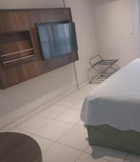 Centro Hotel | Flat com varanda, quarto de Morador Hotel 1112