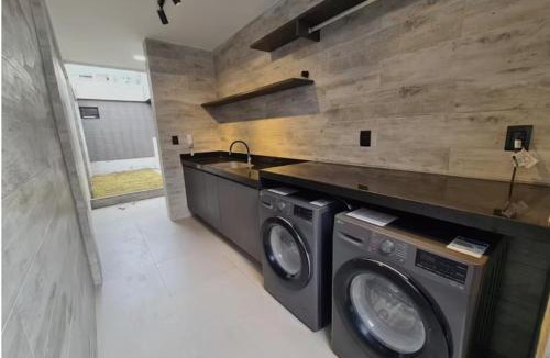 Jardim Oceania Apartment | Flat moderno com varanda e piscina na cobertura
