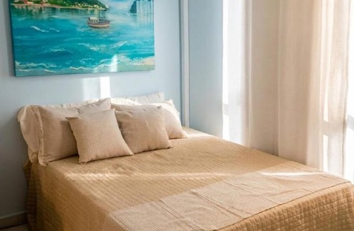 Gonzaga Apartment | Frente Mar no Gonzaga - Garagem - 4 Hóspedes - Ar Condicionado - Wi-Fi - Check-in Digital