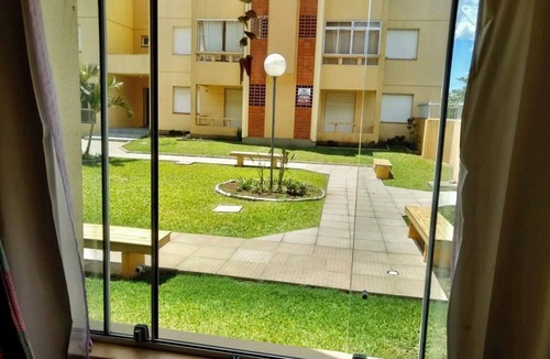 Arroio Teixeira Apartment | Ground floor apartment with garden view