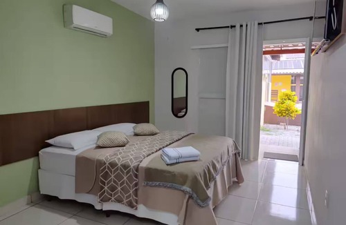 Barra Nova House | Ground floor suite with hammock and private balcony