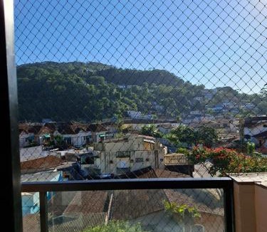 Santo Andre Apartment | Guarujá Enseada,2 quartos, ar, vaga 1 carro, praia à pé