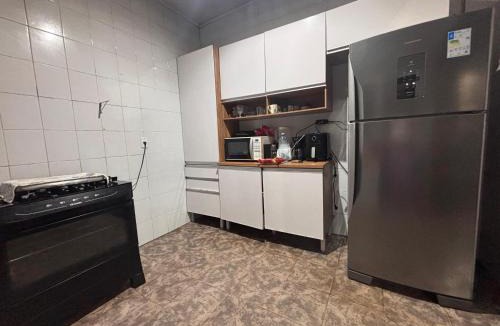 Bom Sucesso House | GuestHouse com Churrasqueira