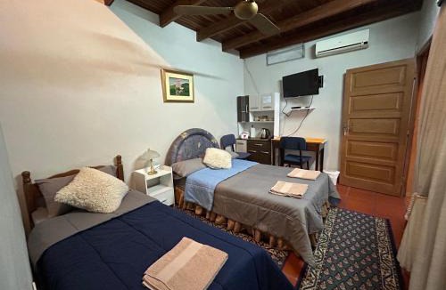 Asuncion House | Habitación en suite, Zona Jockey-Arena