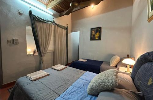 Asuncion House | Habitación en suite, Zona Jockey-Arena