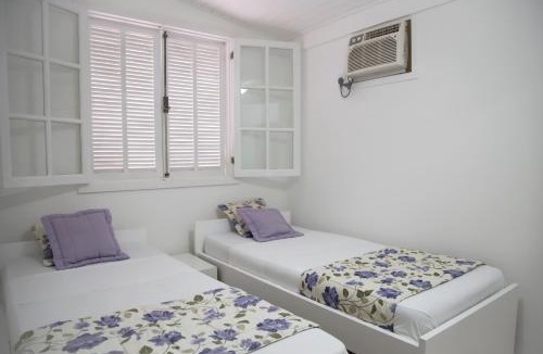 Manguinhos Hotel | Hospedaria Entre Amigos