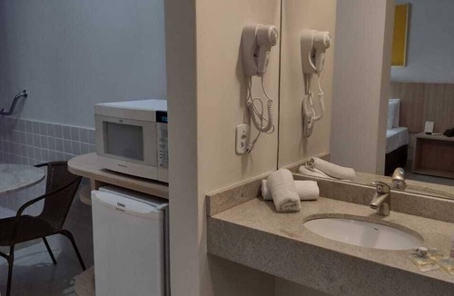 Prive das Caldas Hotel | Hot Springs Flat Apart Hotel c. Banheira