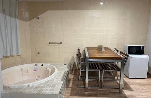 Prive das Caldas Hotel | Hot Springs Flat Apart Hotel c. Banheira