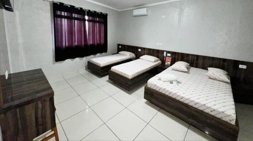 Poa Hotel | Hotel Divisa poá