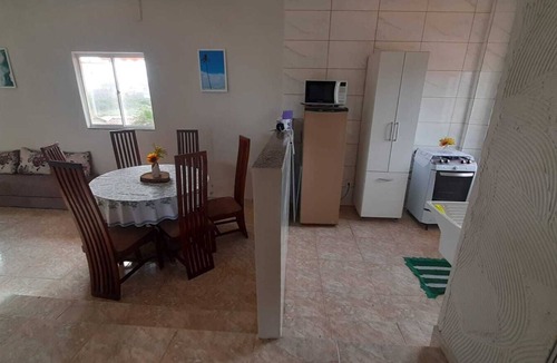 Barra Nova House | House 50m from the beach with a side view of the sea.