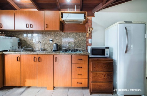 Bombas House | House with solarium overlooking the sea, with heated pool and barbecue.